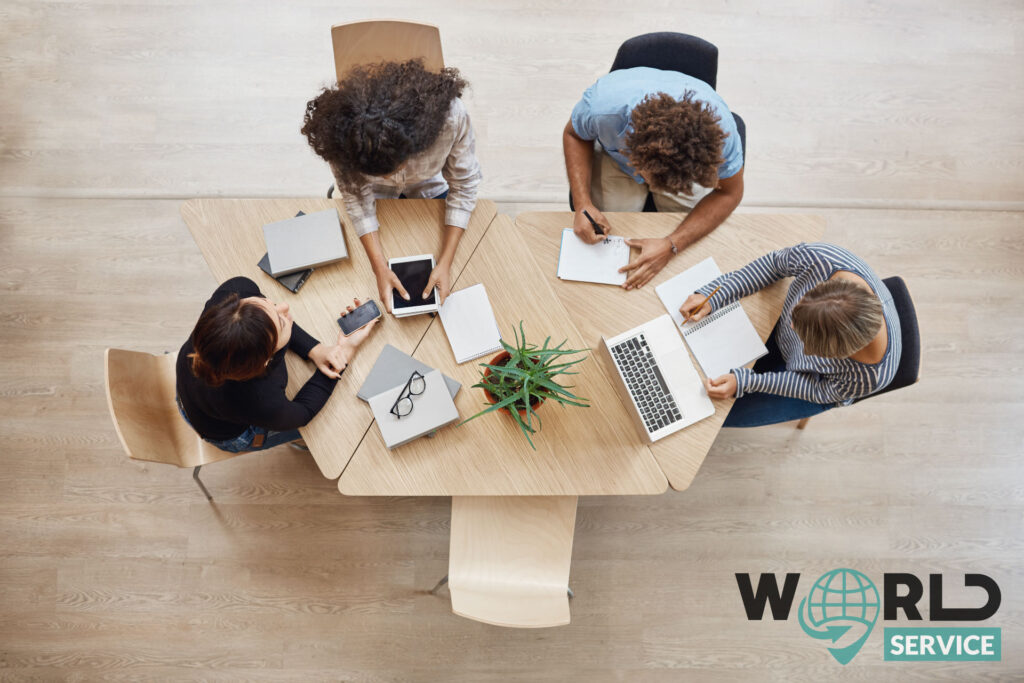 Foto di impiegati al lavoro nel cowoking Stazione Centrale
